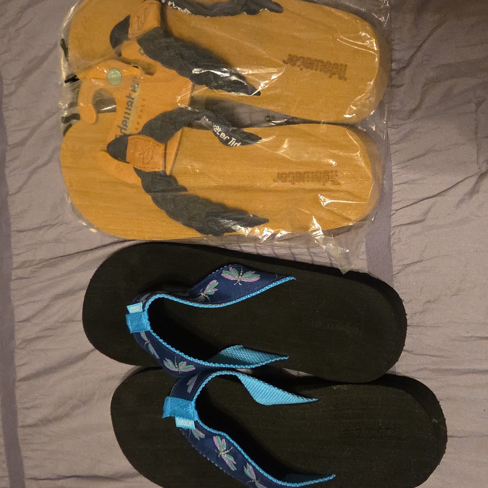 2 Pairs Of Tidewater Flip Flops.  1 Navy Braided and 1 Turquoise Dragonflies.